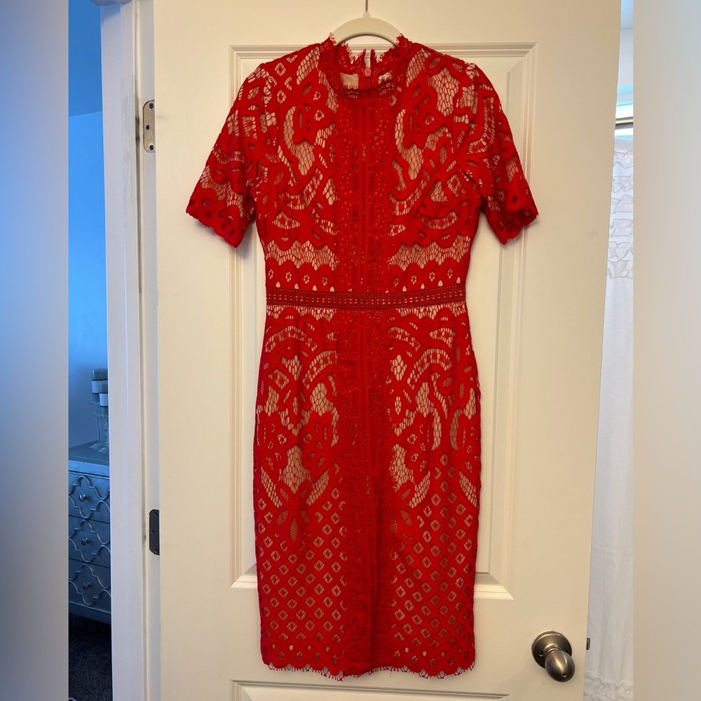 Red and faux-nude knee-length dress